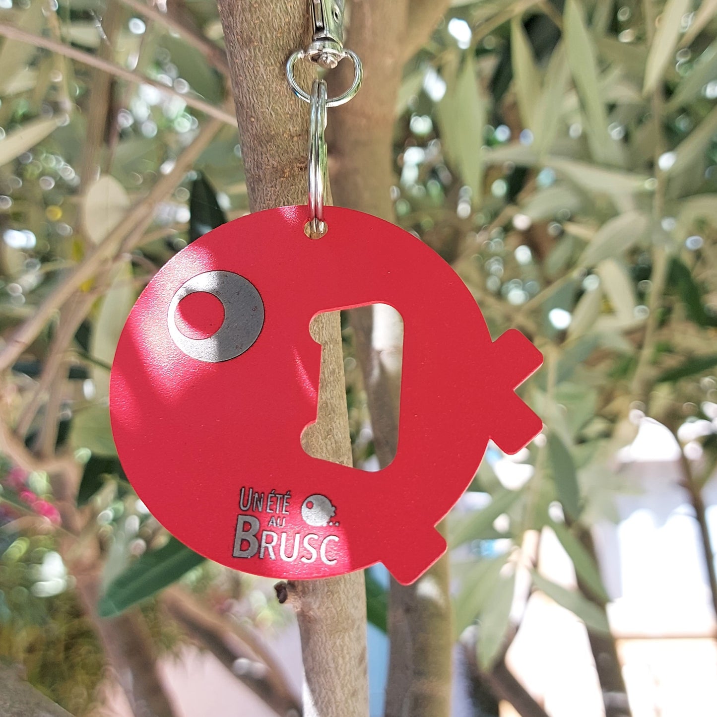 PORTE-CLE DECAPSULEUR